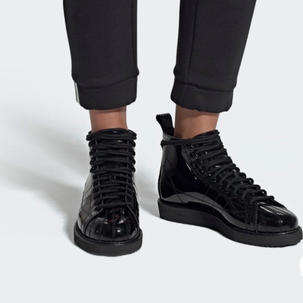 Black high top Adidas Boots